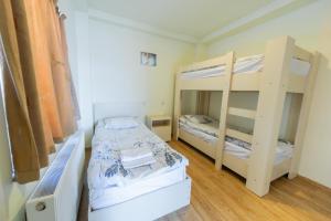 Postel nebo postele na pokoji v ubytování Gudauri private cottage