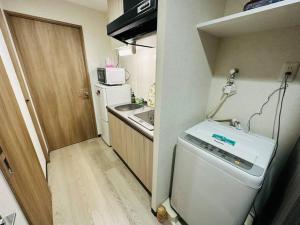 202 黒門市場1分!道頓堀まで徒歩8分!心斎橋まで徒歩9分!にあるキッチンまたは簡易キッチン