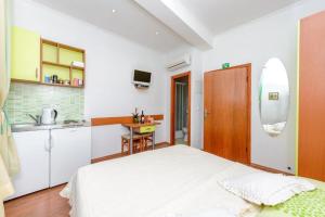 Η κουζίνα ή μικρή κουζίνα στο Studio Apartments Stradun