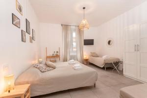Llit o llits en una habitació de Guesthouse Tree Rooms Modern