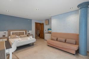 a living room with a couch and a table at Villa Soler House in Malaga by Costarentals - MAL03 in Málaga +47 photos