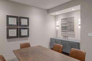 a dining room with a table and chairs at TownePlace Suites by Marriott Framingham in Framingham +29 photos