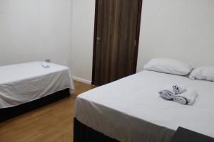 Ένα ή περισσότερα κρεβάτια σε δωμάτιο στο AP 411- Apart OH