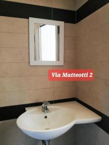Kúpeľňa v ubytovaní Via Matteotti & Via Carracci Apartments