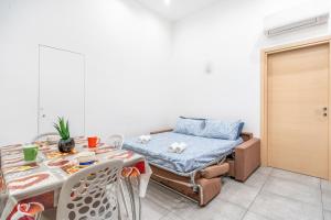 A seating area at LE14 -Duomo-Loreto- Wifi - Central - Modern