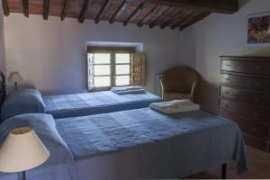 Letto o letti in una camera di Frantoio di Corsanico