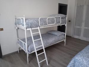 a couple of bunk beds in a room at Ca' d'Luca in Ravenna