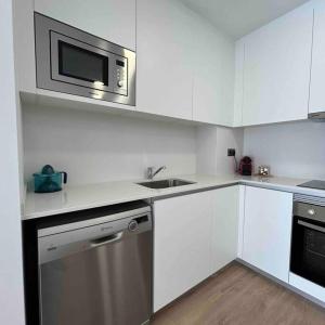 Η κουζίνα ή μικρή κουζίνα στο Fabuloso apartamento en zona tranquila