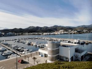 a marina with a bunch of boats in the water at Santa Parascheva Can Pau in Llança