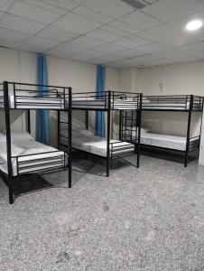 Postel nebo postele na pokoji v ubytování Hoomy Hostel + 14 fotografií