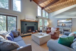 a living room with couches and a fireplace at LUX Popular Lakefront, Close to Ski, Snowboard, Games in Bushkill