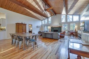 a large living room with a table and chairs at LUX Popular Lakefront, Close to Ski, Snowboard, Games in Bushkill