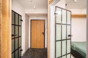 Posteľ alebo postele v izbe v ubytovaní NovaNest Apartments - Kalwaryjska - by Upstairs