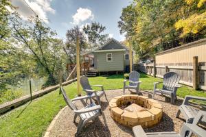 a backyard with chairs and a fire pit at Waterfront Home Allegheny River Access, Dock Slip in Ford City