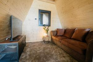 Posezení v ubytování Azalea Chalet