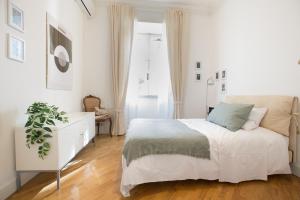 Voodi või voodid majutusasutuse Destination Rome San Giovanni homey flat - 3 BDRs - Metro A toas