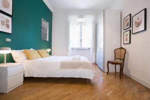 Voodi või voodid majutusasutuse Destination Rome San Giovanni homey flat - 3 BDRs - Metro A toas