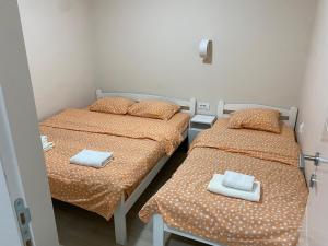 Ein Bett oder Betten in einem Zimmer der Unterkunft Ena lux Divčibare
