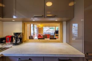 Η κουζίνα ή μικρή κουζίνα στο Les Platanes I1 - 6 pers - centre station