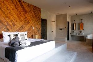 Postel nebo postele na pokoji v ubytování Hotel Macondo Estilo Holbox