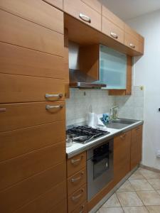 Kuchyň nebo kuchyňský kout v ubytování BILOCALE VIA CURZI centralissimo