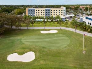 an aerial view of a golf course at a resort at Fairfield Inn & Suites by Marriott Fort Lauderdale Northwest in Tamarac