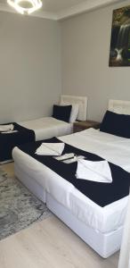 Postel nebo postele na pokoji v ubytování Taksim Millennium Suit Hotel