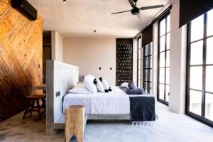 Postel nebo postele na pokoji v ubytování Hotel Macondo Estilo Holbox
