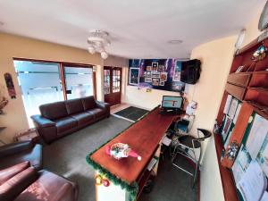 TV a/nebo společenská místnost v ubytování Hotel Estación Sabana