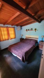 Una cama o camas en una habitación de Hakuna Matata