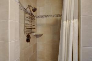 a bathroom with a shower with a shower curtain at Wine Country Ranch Escape in Buellton