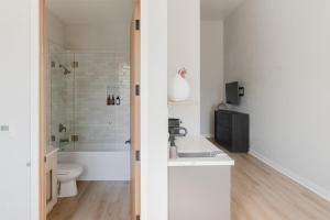 a bathroom with a sink and a toilet at Villa Castillo 2 in Santa Barbara