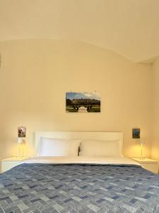 Ένα ή περισσότερα κρεβάτια σε δωμάτιο στο ART SUITE NEL CUORE DI PORTICI