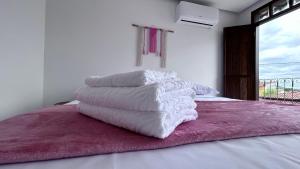 Cama ou camas em um quarto em Pousada Estrelar