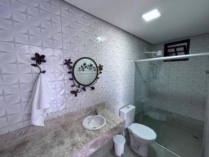 Um banheiro em Pousada Estrelar