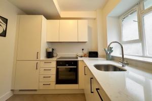 Kuhinja oz. manjša kuhinja v nastanitvi Be London - Farringdon Apartments