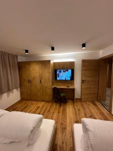 Łóżko lub łóżka w pokoju w obiekcie Ferienwohnung Krallinger