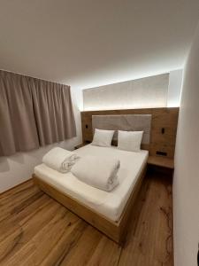 Łóżko lub łóżka w pokoju w obiekcie Ferienwohnung Krallinger