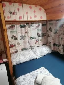 Łóżko lub łóżka w pokoju w obiekcie Habitaciones Don Pancho