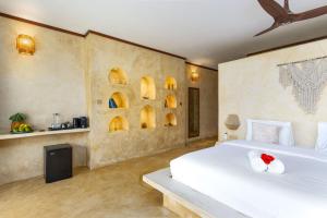 Postel nebo postele na pokoji v ubytování Safaya Luxury Villas - Adults only + 37 fotografií