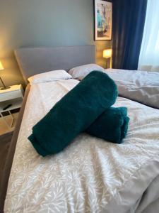 Postel nebo postele na pokoji v ubytování Moderne Wohnung Nähe Hauptbahnhof Linz