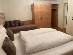 Postel nebo postele na pokoji v ubytování Bergdiamant Nauders