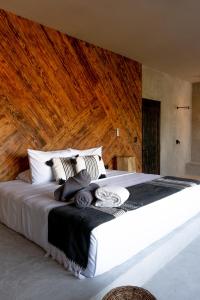 Postel nebo postele na pokoji v ubytování Hotel Macondo Estilo Holbox