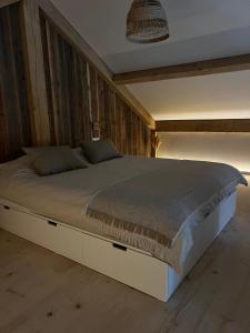 Postel nebo postele na pokoji v ubytování Chalet Hoge Kempen