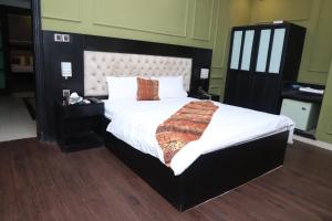 Postel nebo postele na pokoji v ubytování Winter Hotel