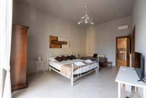 Postel nebo postele na pokoji v ubytování CONTE CAVOUR