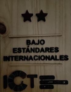 a sign that says balo landmarks international at Salamandra Costa Rica in Jiménez