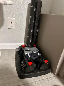 a black remote control sitting on top of a wall at New, Fun-Size Benbow House! in Garberville