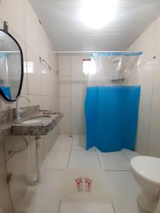 Koupelna v ubytování Pousada Aconchego Sol e Mar