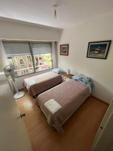 מיטה או מיטות בחדר ב-Apartamento en Pocitos